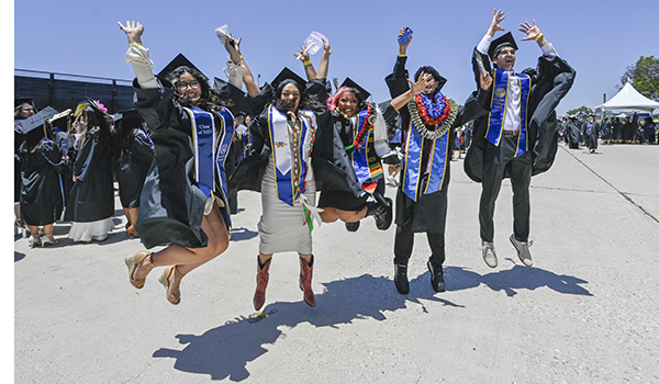 students jumping for joy