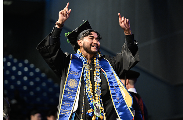 Philip Hernandez crossing the stage